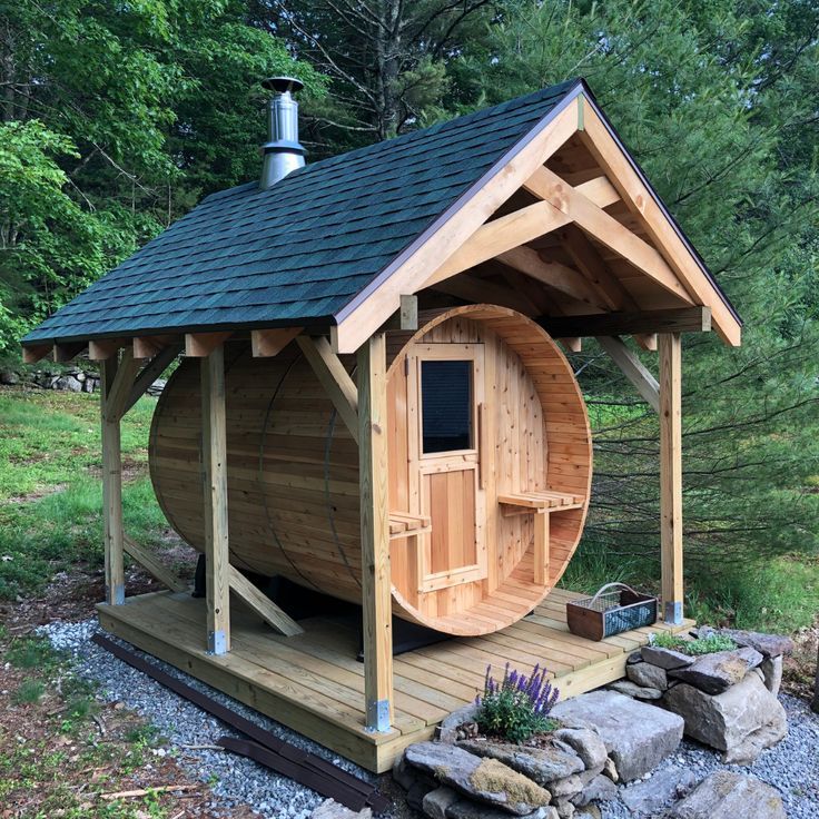 barrel sauna with a roof